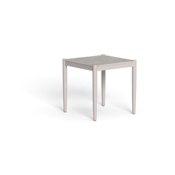 The aluminum structure is often available in finishes like warm white or graphite, while the stoneware top can come in beige or dark gray tones.