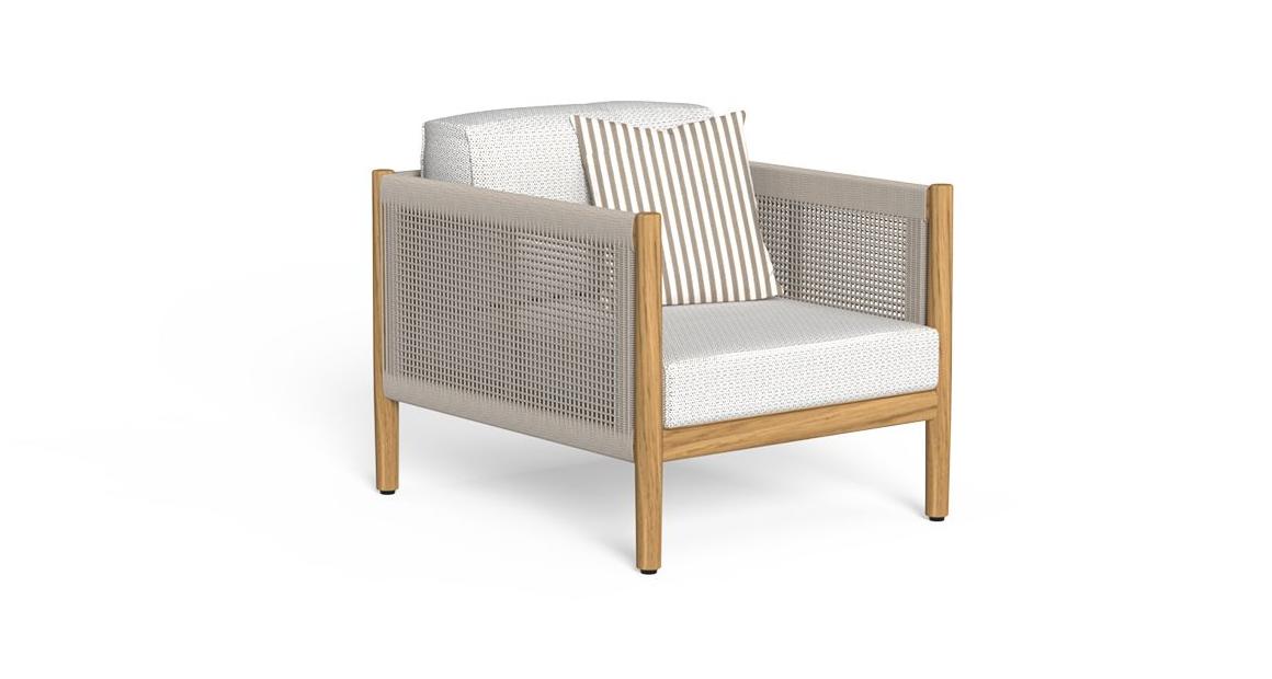 "Cozy and refined Dolcevita armchair with minimalist elegance and deep comfort, by Talentispa."