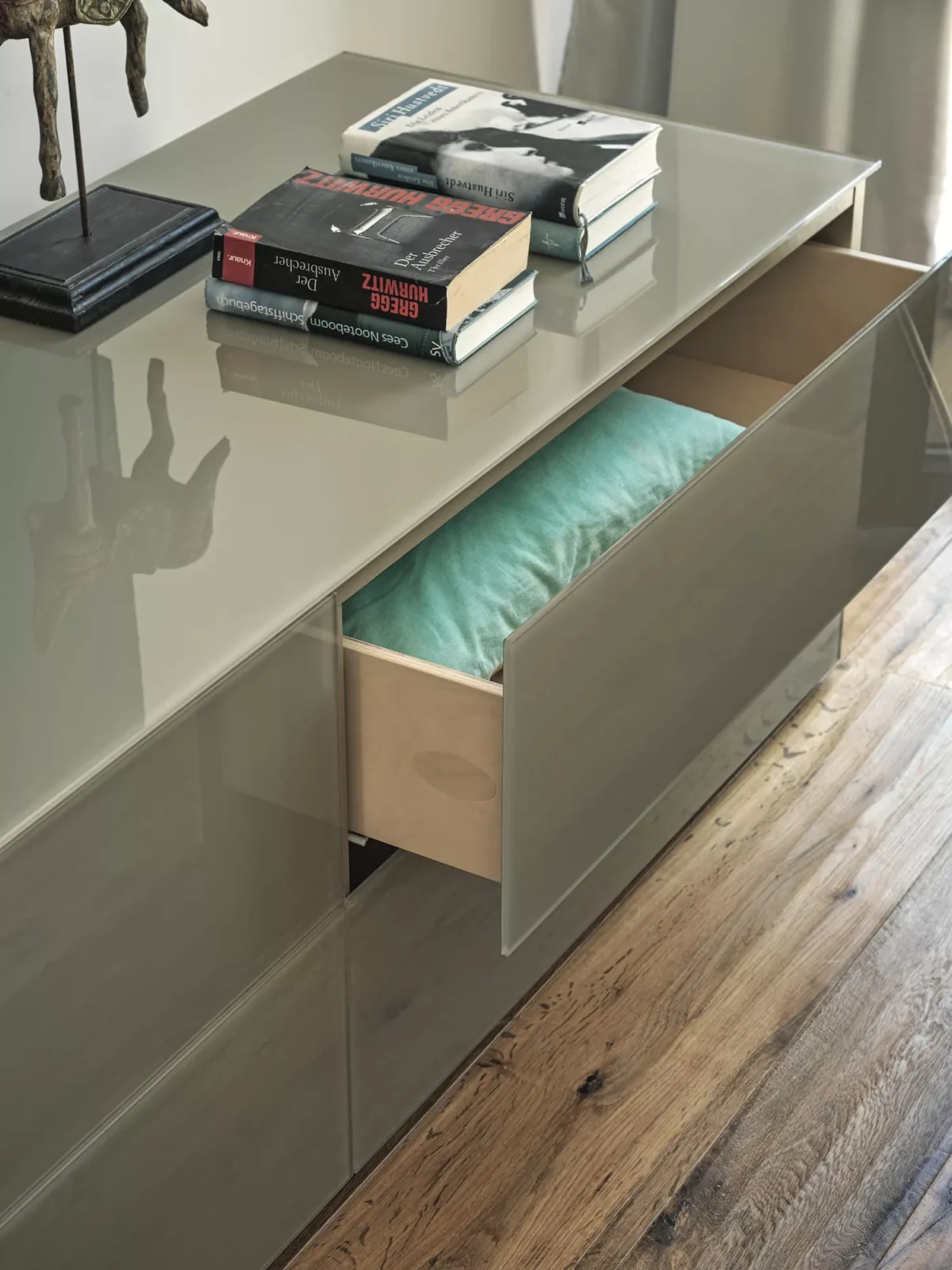 Modern Enea sideboard by Bontempi in Royal Oak, MI featuring a matte lacquered wood structure and glossy lacquered glass panels.