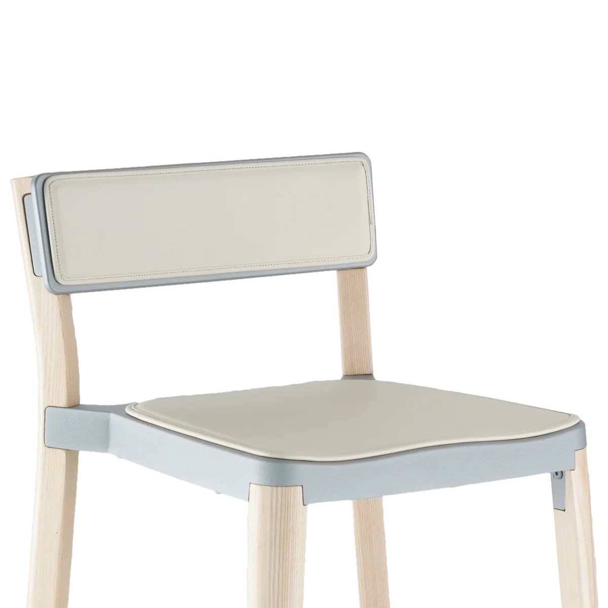Lancaster Chair by Emeco, designed by Michael Young, combining a solid ash wood frame with recycled aluminum components for a sustainable and modern design.