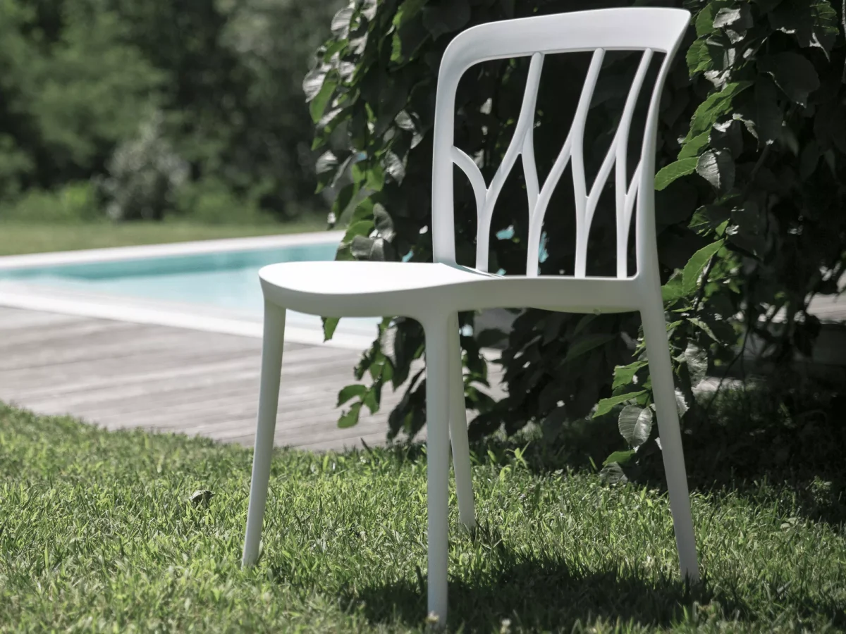 Bontempi Galaxy table paired with upholstered dining chairs
