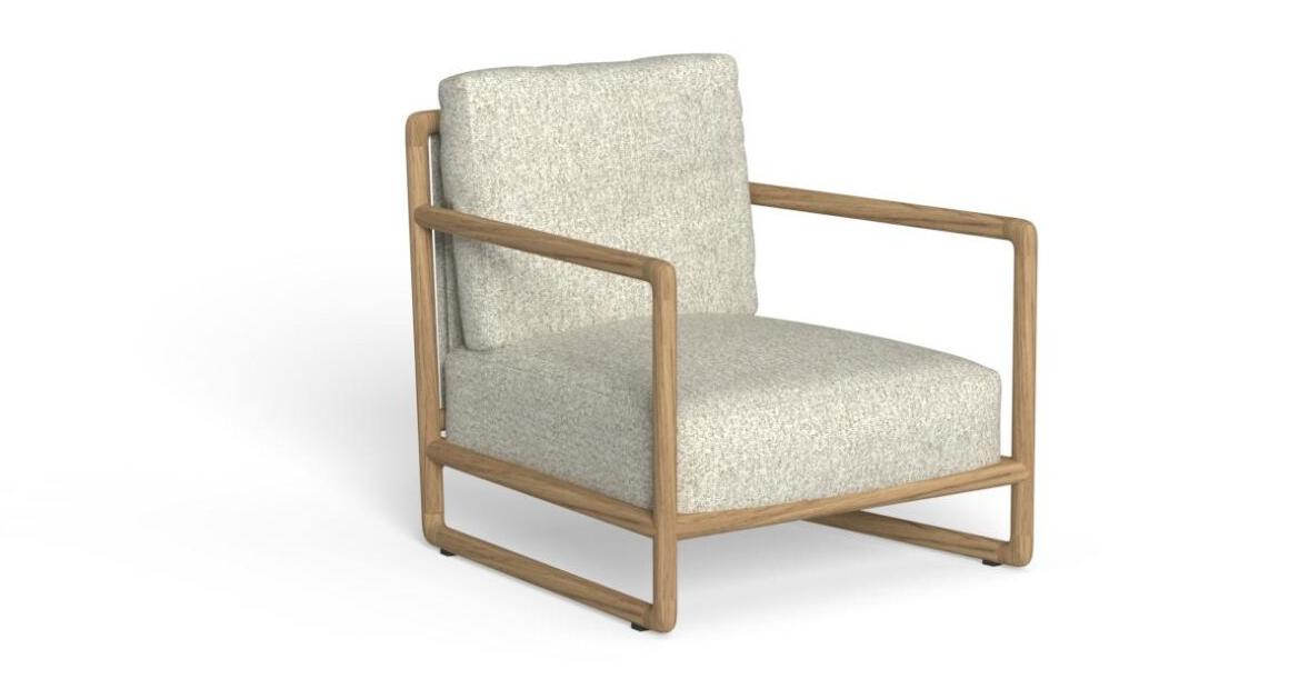 "Sculptural Jun Lounge Armchair by TalentiSpa ideal for elegant outdoor lounging experiences."
