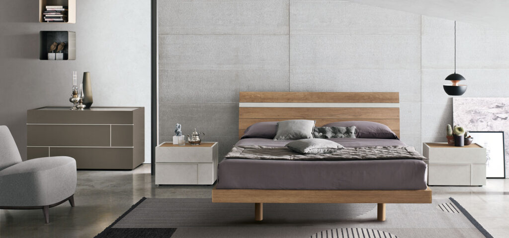 “Joker bed by Tomasella – modern Italian bed with low-profile design and tall cushioned headboard in minimalist styling”