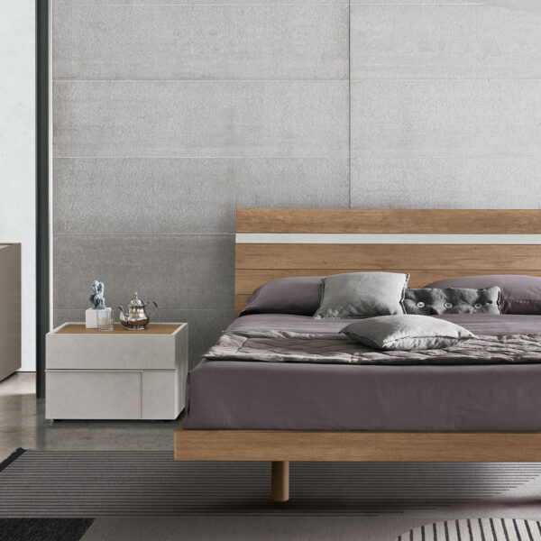 “Joker bed by Tomasella – modern Italian bed with low-profile design and tall cushioned headboard in minimalist styling”