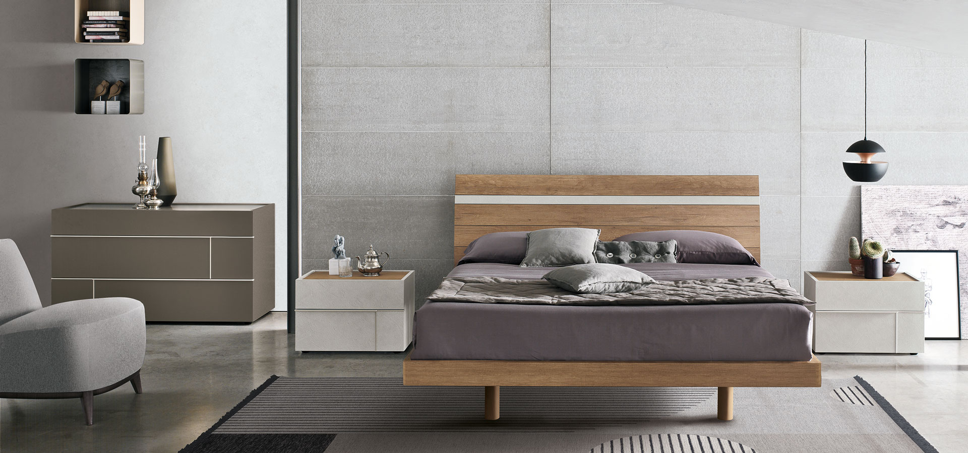 “Joker bed by Tomasella – modern Italian bed with low-profile design and tall cushioned headboard in minimalist styling”