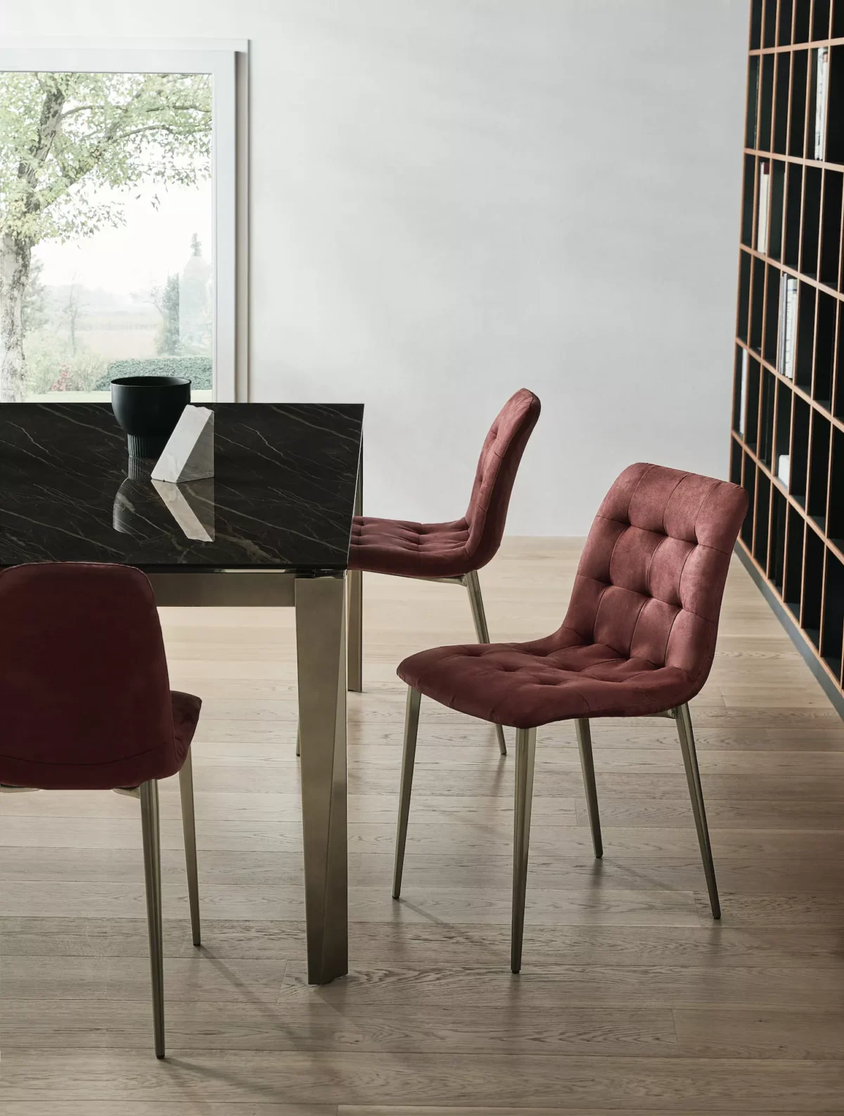 Bontempi Slim Plague table paired with contemporary upholstered chairs