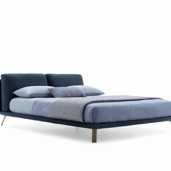 “Ditre Italia Kanaha bed – minimalist platform bed combining soft fabric panels with lightweight structure”
