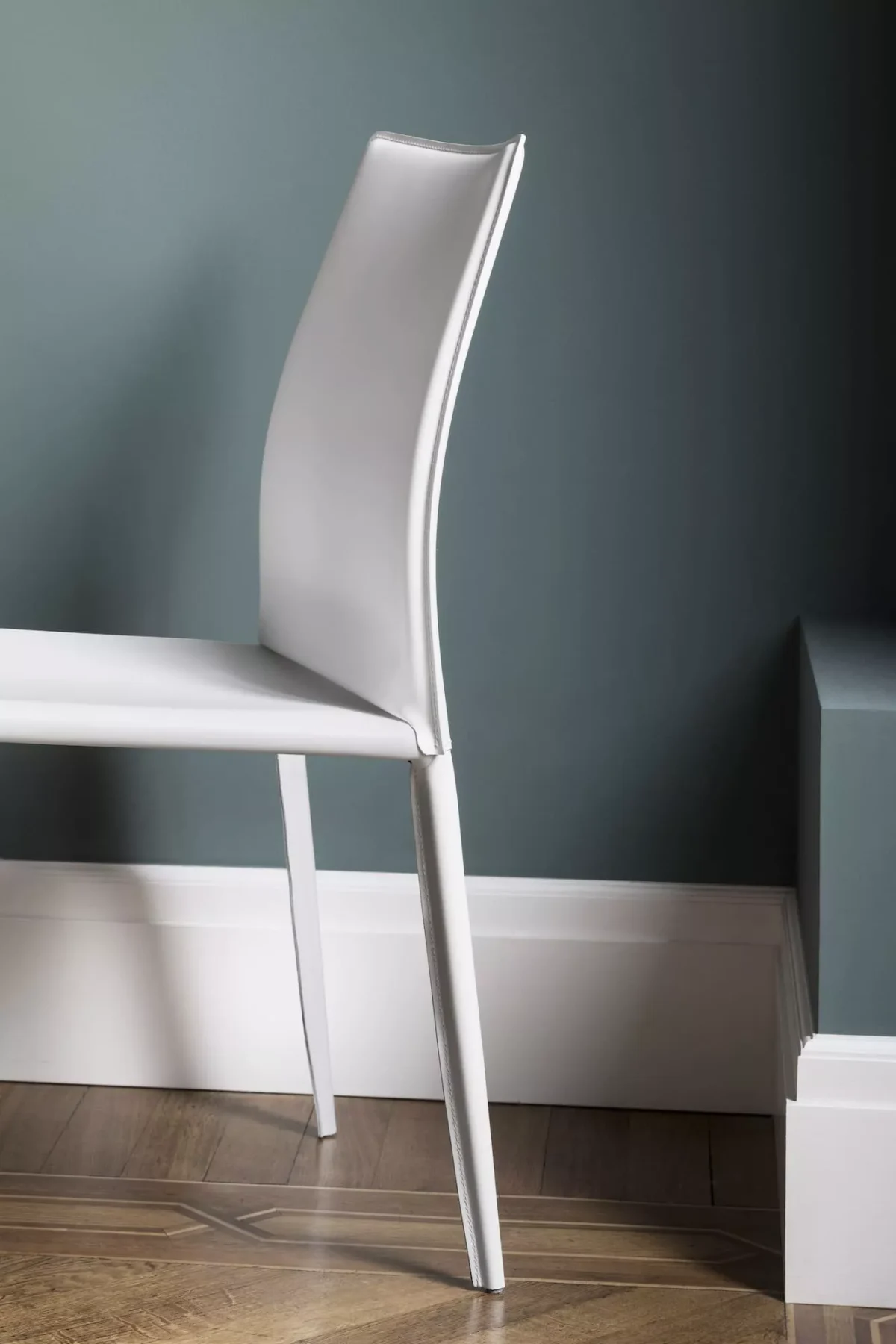Bontempi Linda seating paired with a sculptural pedestal table in open-plan space