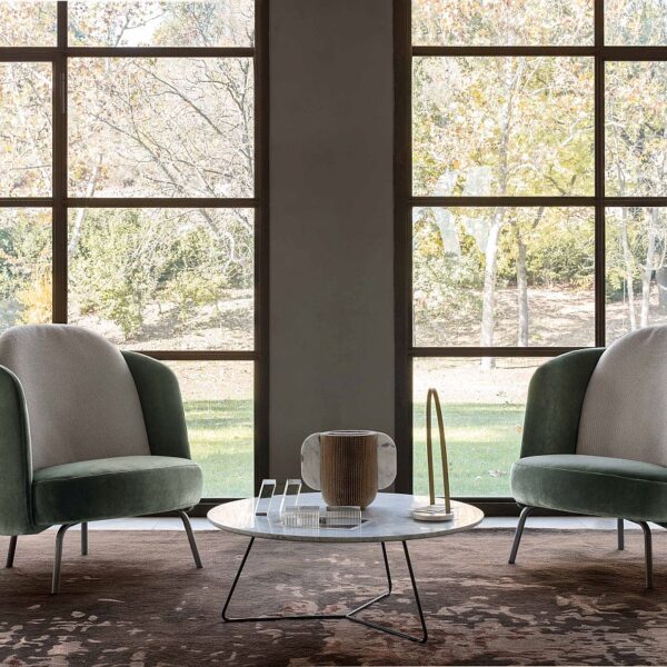 “Ditre Italia LUCIA – modern designer armchair featuring curved silhouette, tailored fabric, and minimalist base”