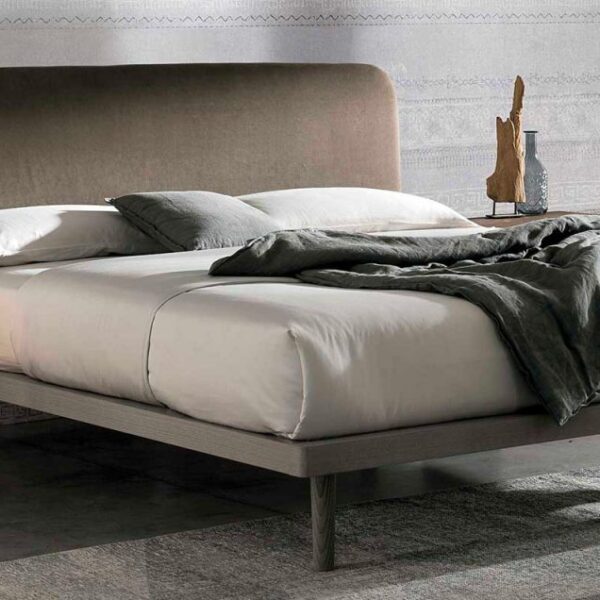 “Milly single bed by Tomasella – modern Italian children’s bed with curved upholstered headboard and clean-lined frame”