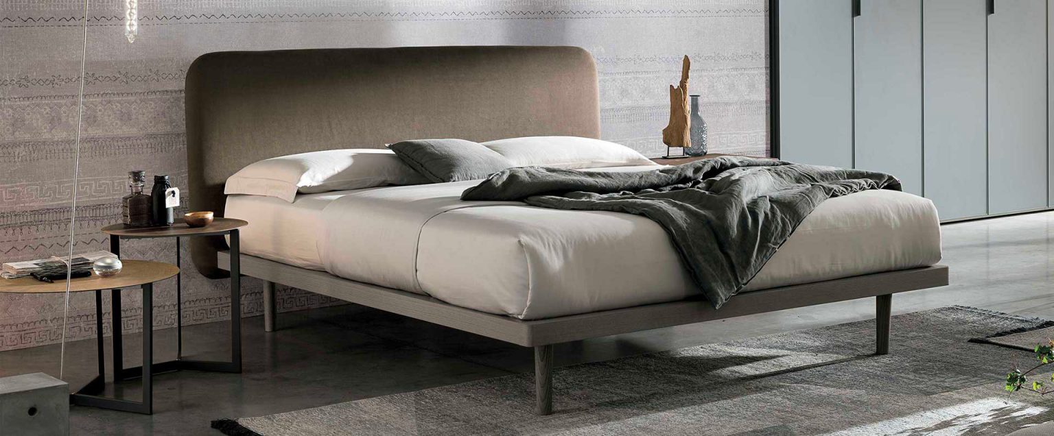 “Milly single bed by Tomasella – modern Italian children’s bed with curved upholstered headboard and clean-lined frame”