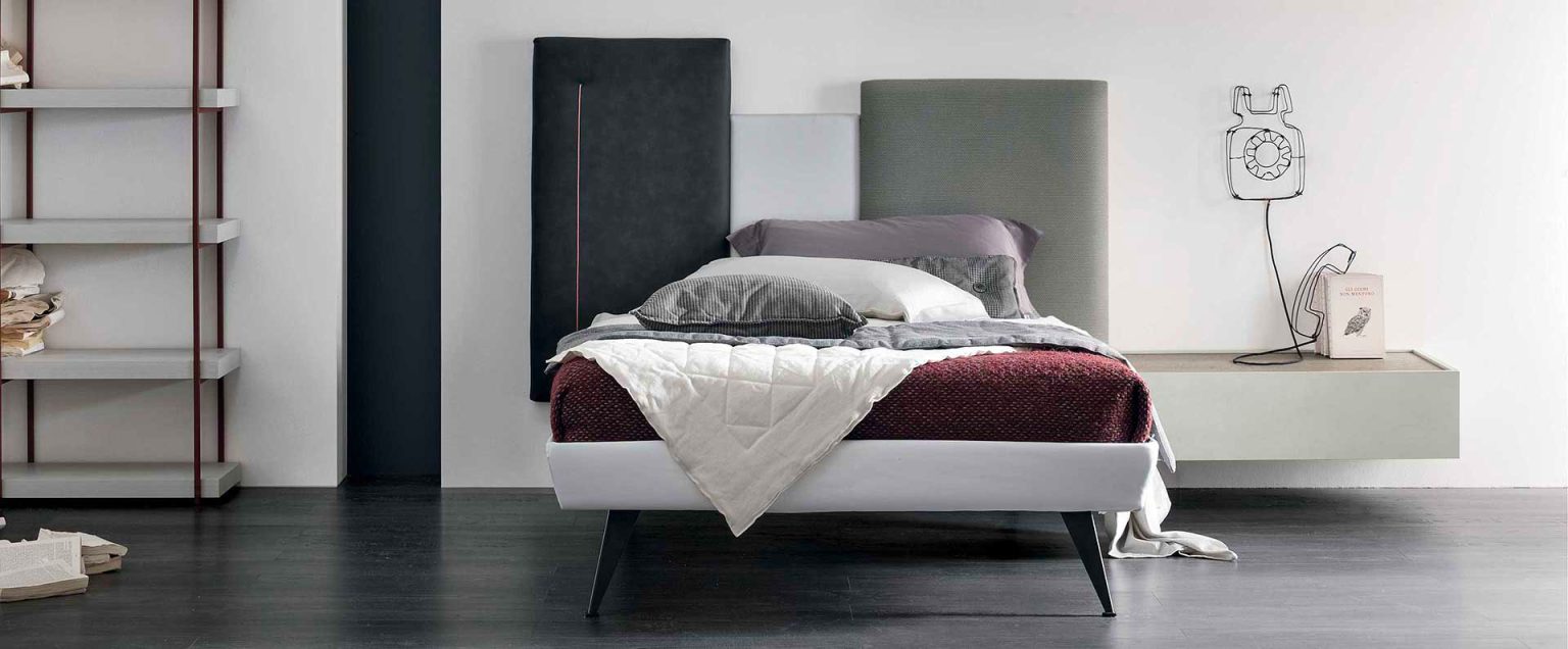 “Skyline single bed by Tomasella – modern Italian youth bed with tall upholstered headboard and minimalist frame”