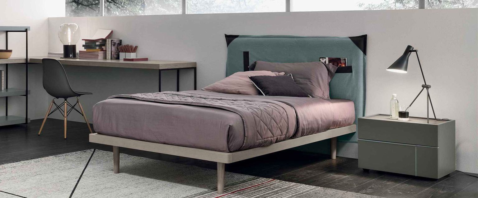 “Tasca single bed by Tomasella – modern Italian youth bed with integrated storage pocket and upholstered headboard”