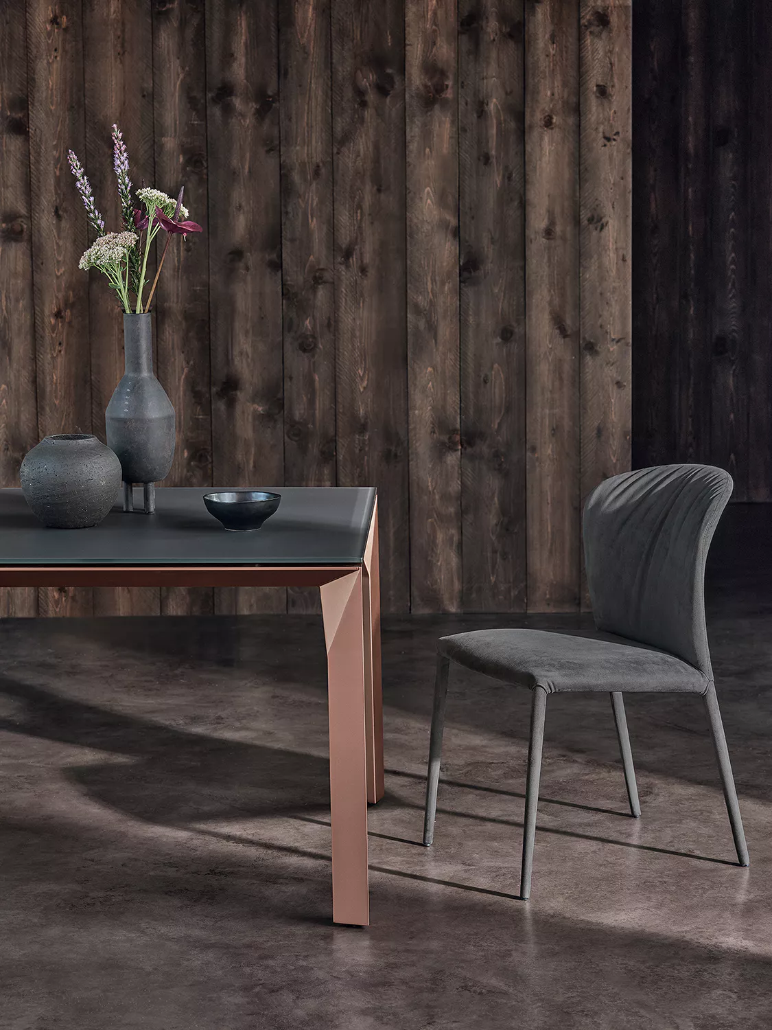 “Grace chair by Bontempi in forest green velvet, featuring a fully upholstered shell version with covered legs and plush seating.”