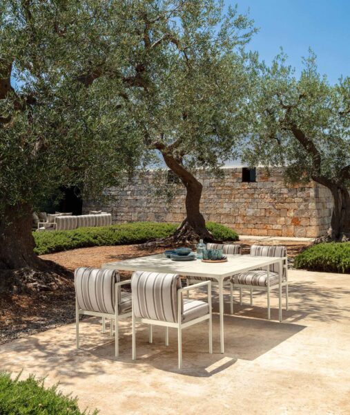 Nalu Dining Armchair by Talenti – elegant outdoor armchair with flowing lines and supportive armrests