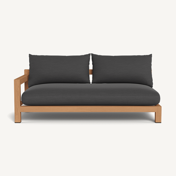 “Outdoor sectional teak sofa by Harbour – two-seater with one arm in minimalist coastal style”