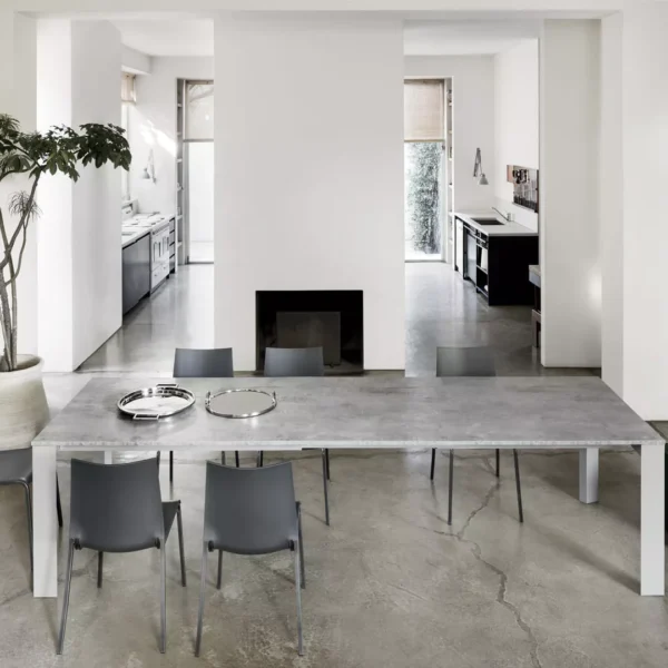 Pascal 160/213/266/319 cm table by Bontempi Casa with a SuperMarble Matt White top and sand lacquered metal legs.