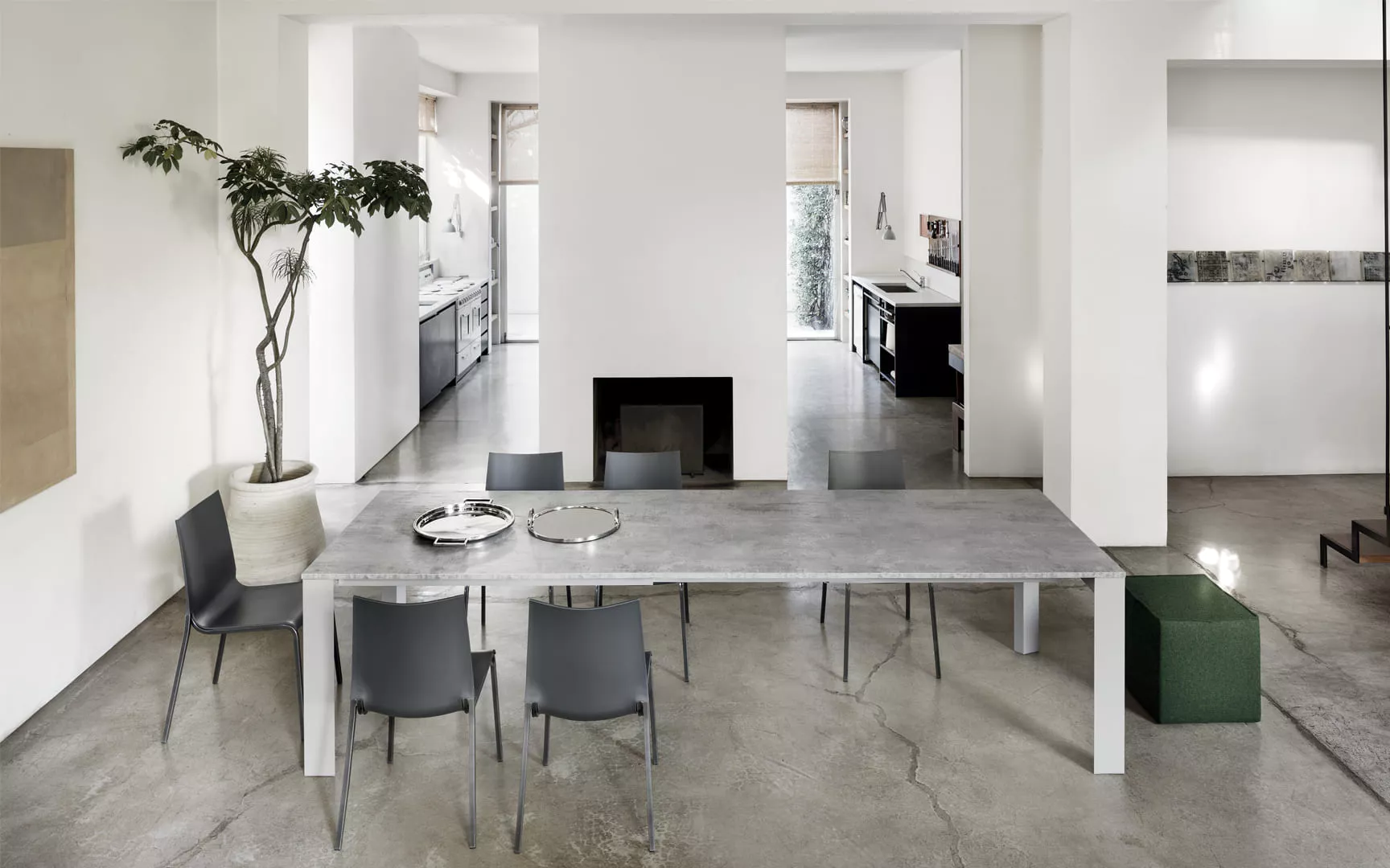 Pascal 160/213/266/319 cm table by Bontempi Casa with a SuperMarble Matt White top and sand lacquered metal legs.