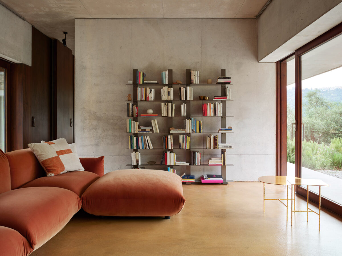 Pacifico modular wall-mounted steel bookcase by Opinion Ciatti in matte white, featuring open shelving and minimalist design, showcased in Royal Oak, Michigan showroom.