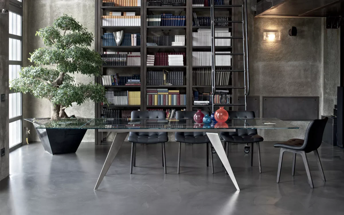 Ramos extendable by Bontempi featuring black velvet-matt glass top and glossy black tapered legs for a sleek architectural look.