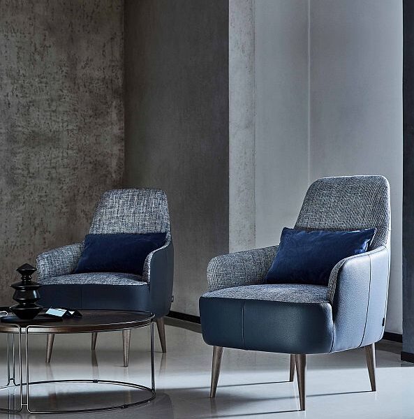 “Ray armchair by Ditre Italia – contemporary Italian lounge chair with curved backrest and sleek metal legs”