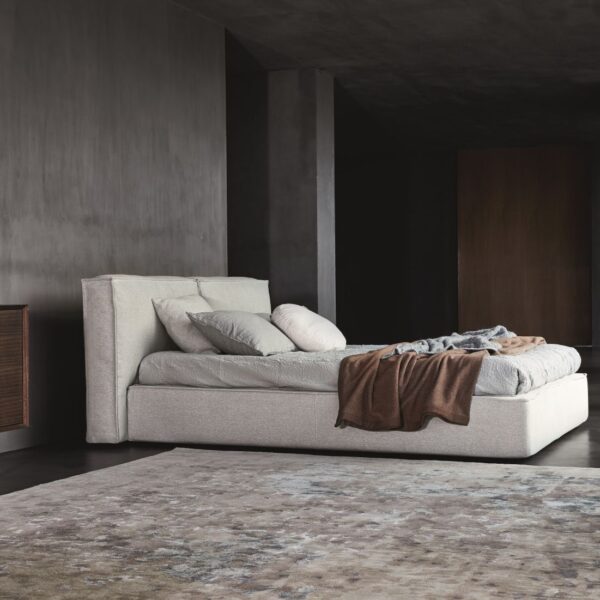 “Flann 2.0 bed by Ditre Italia – modern Italian upholstered bed with oversized headboard and refined lines”
