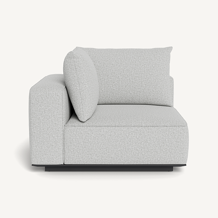 “Santorini Outdoor Corner Left in modern patio setting – minimalist design with plush cushioning”