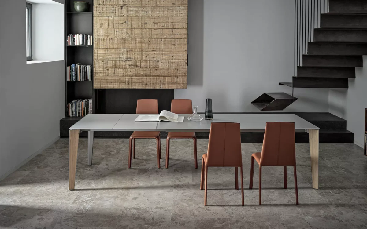 Modern dining room showcasing Alice chairs by Bontempi around glass-top table