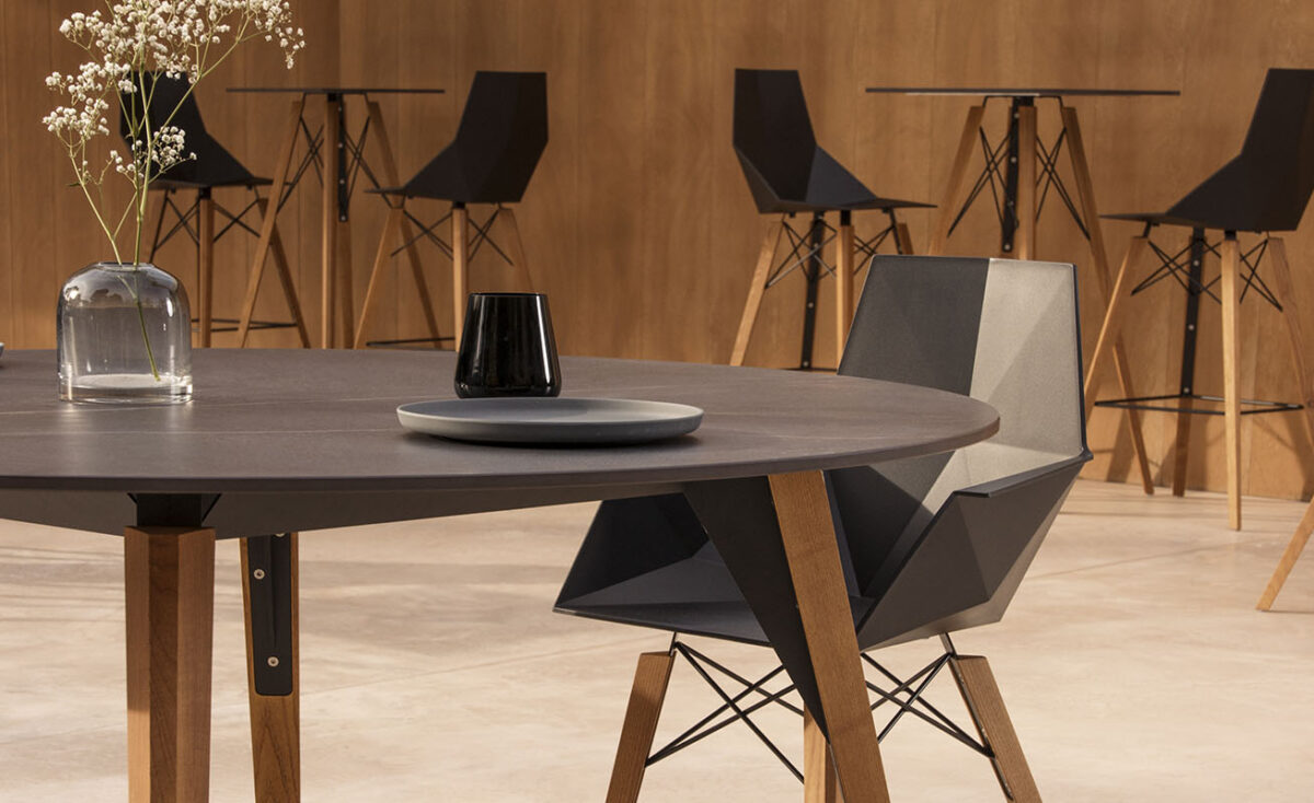 Modern outdoor FAZ Wood Stool blending organic textures and sleek design for elevated lounge spaces