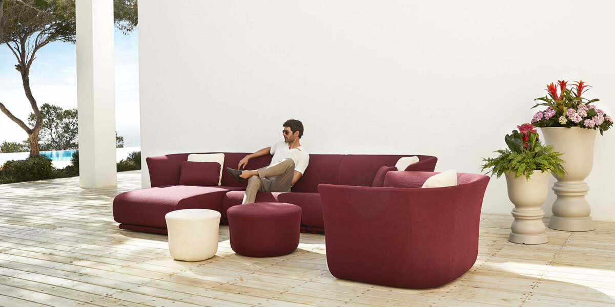Elegant SUAVE Puff by Vondom with smooth texture and premium outdoor fabric for garden relaxation