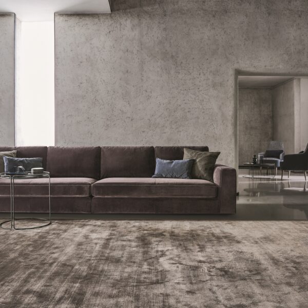 “Modern Loman sectional sofa by Ditre Italia – plush Italian lounge seating with slim arms and tailored finishes”