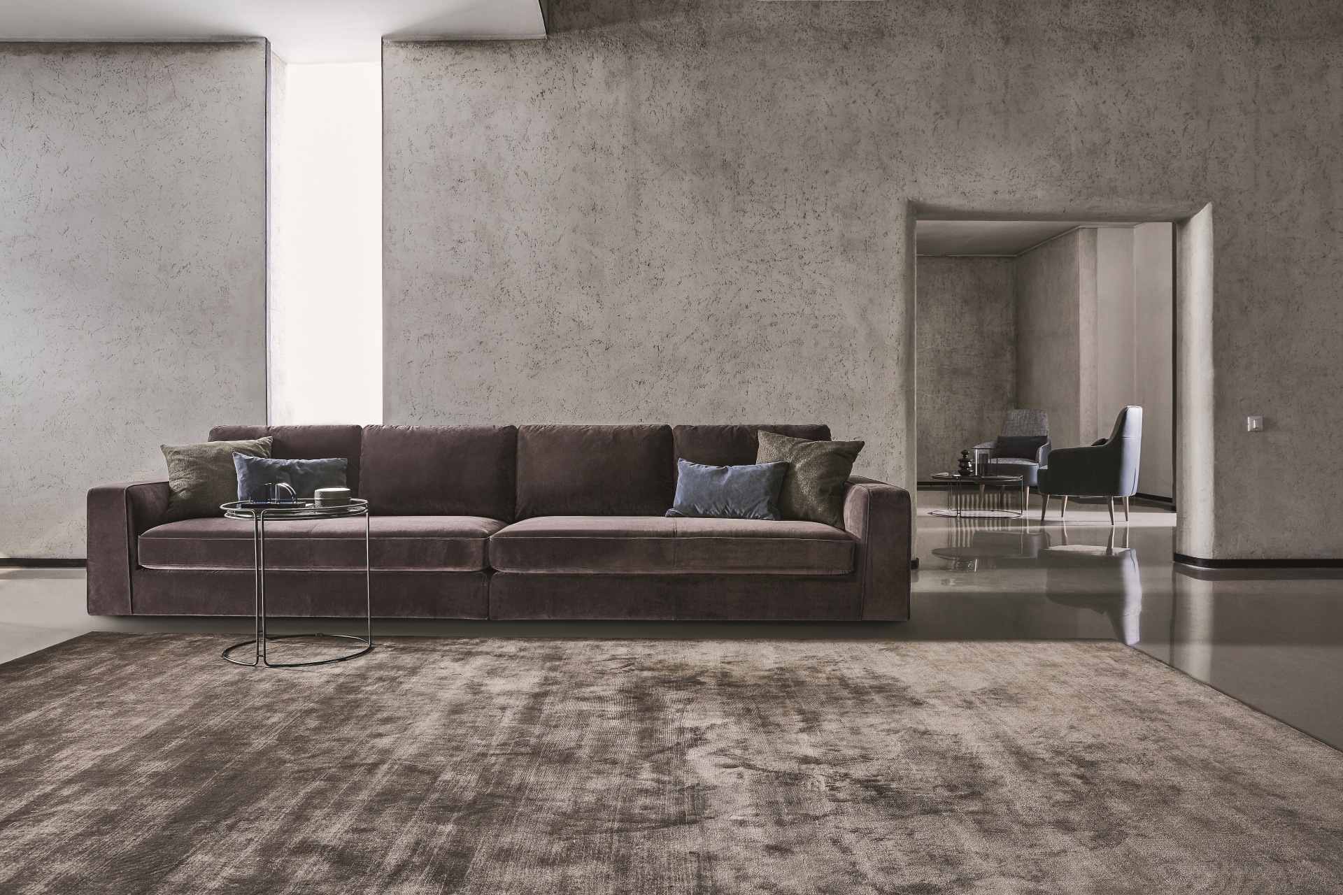 “Modern Loman sectional sofa by Ditre Italia – plush Italian lounge seating with slim arms and tailored finishes”