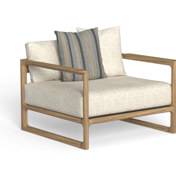"Designer Thea armchair by Talentispa with luxurious seating and subtle cottage-modern charm."