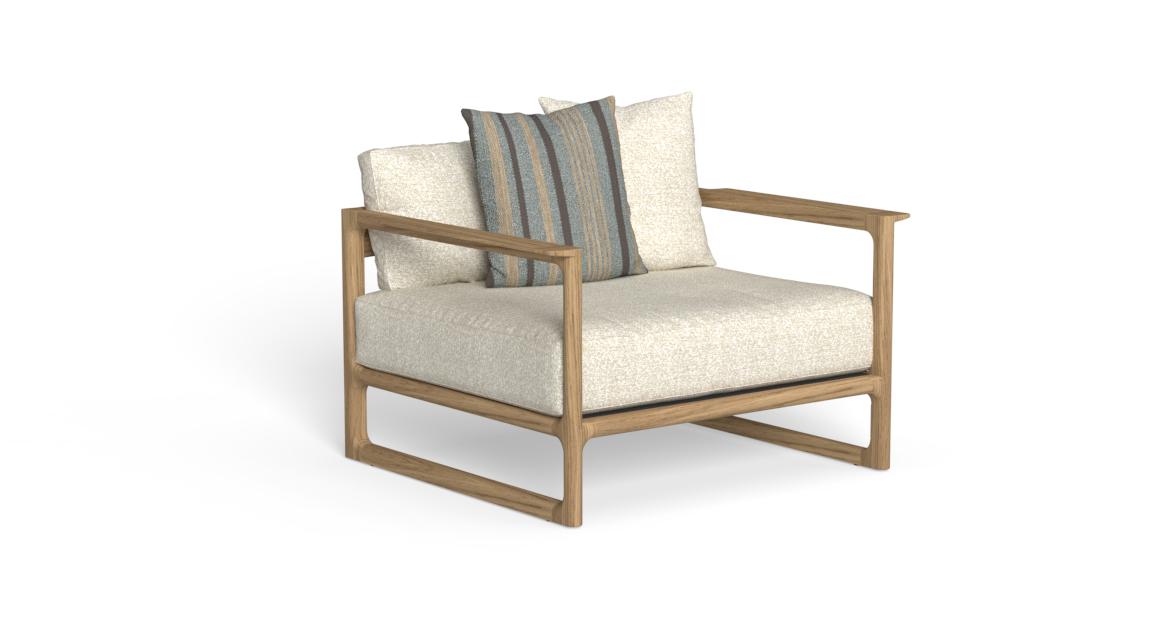 "Designer Thea armchair by Talentispa with luxurious seating and subtle cottage-modern charm."