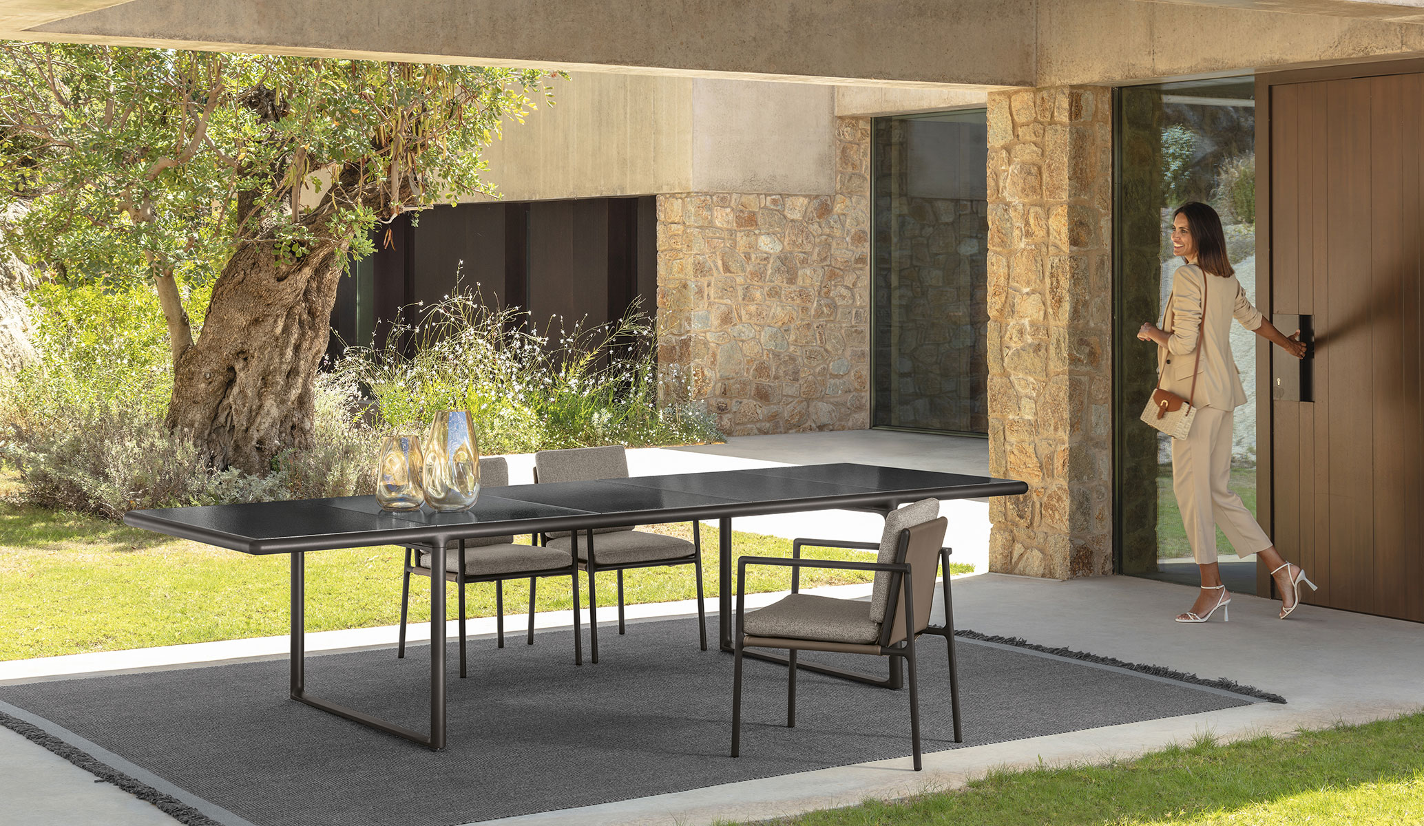 Woven Dining Table 270×110 by Talenti – large rectangular outdoor table with woven rattan-style base and sleek top