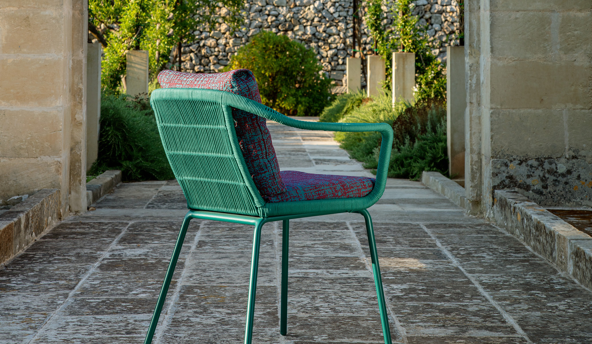 Scacco Dining Armchair at Italcasa Design in Birmingham. A stylish Italian rope-back chair, perfect for elegant outdoor dining.
