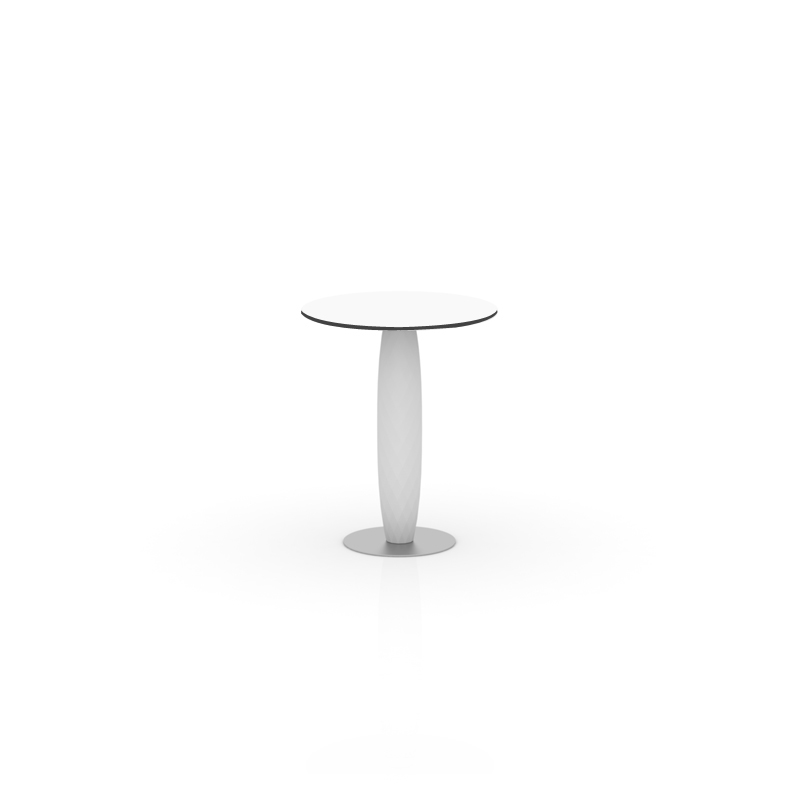 "Design-forward dining table by Vondom with a faceted base and clean tabletop from the VASES series."