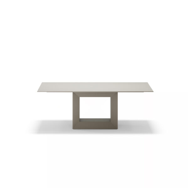 "Sculptural VELA dining table by Vondom, ideal for outdoor and indoor modern environments."