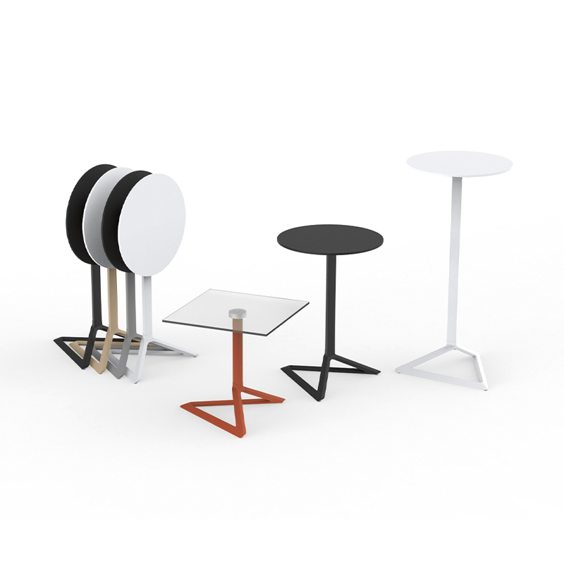 "Vondom DELTA tables with polygonal bases and minimalist design perfect for dining or lounge areas."