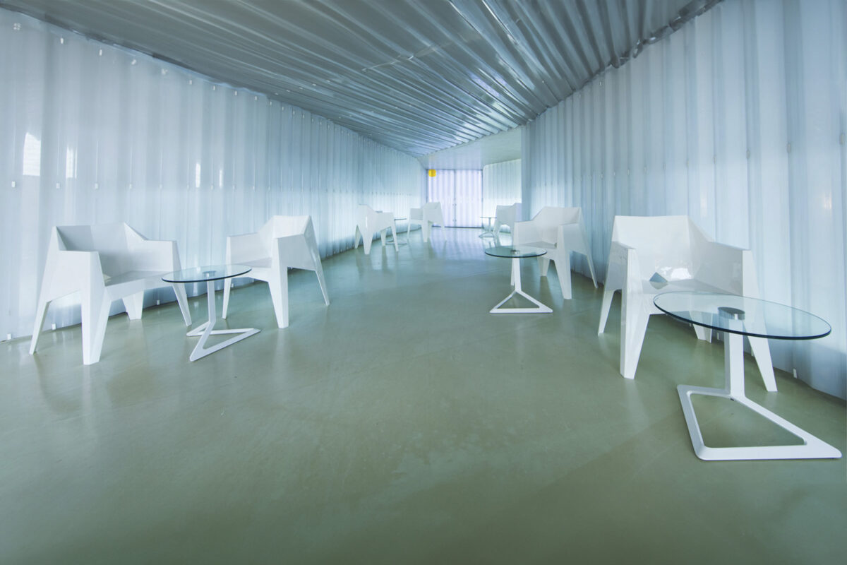 "DELTA tables by Vondom designed for indoor and outdoor use with modern aesthetics."