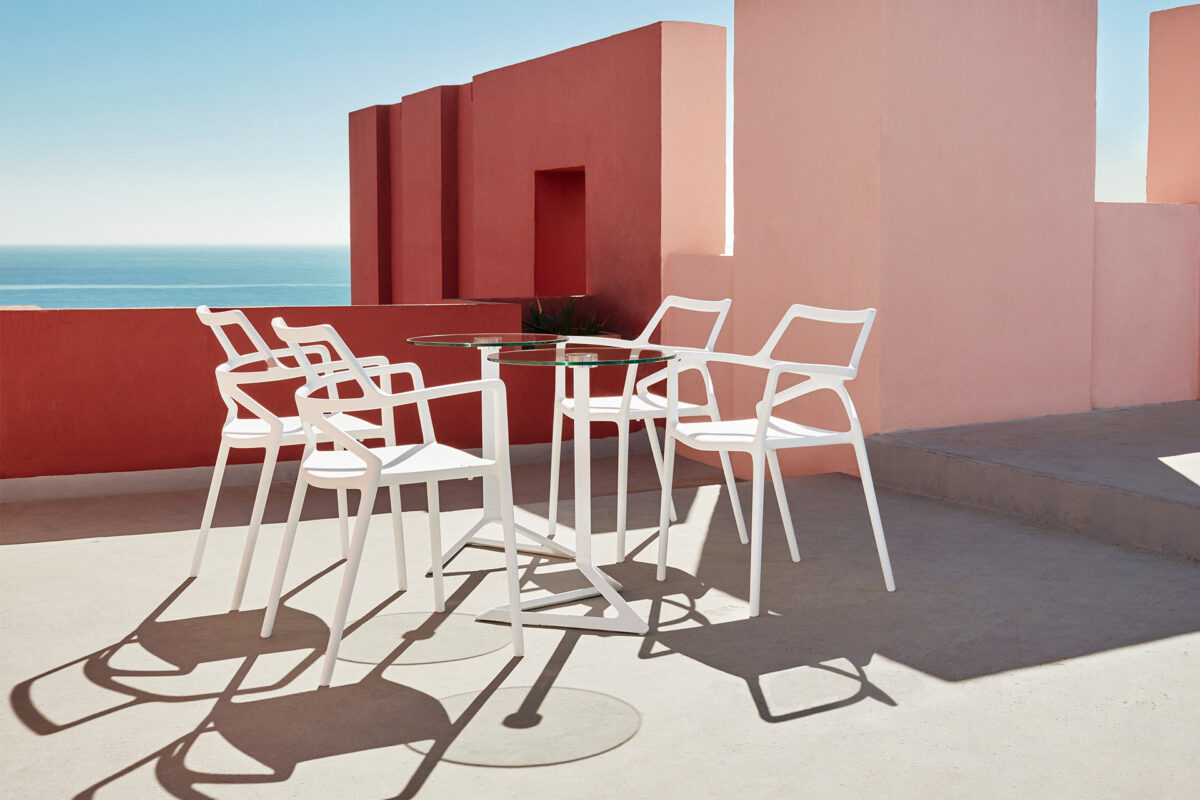 "Modern DELTA tables collection by Vondom with clean lines and sturdy construction."