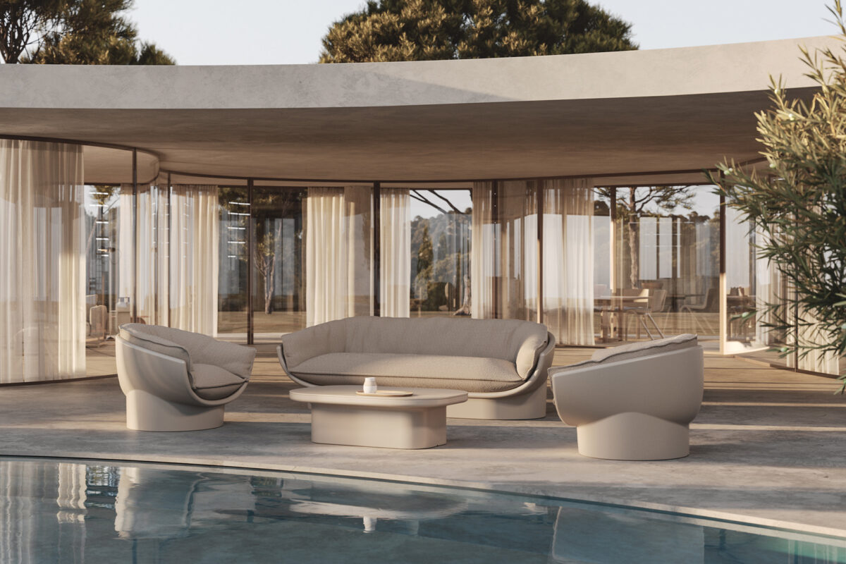 "Sculptural lounge chair LUNA by Vondom with organic form and refined finish."