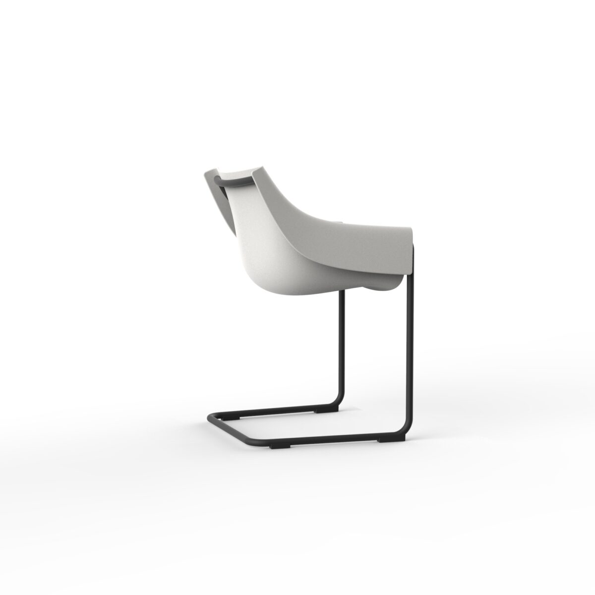 "Sculptural MANTA Cantilever Chair by Vondom made from durable, weather-resistant materials."