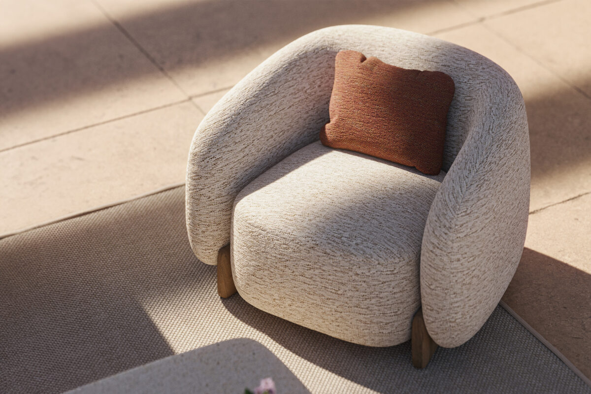 "Comfort-focused MILOS lounge chair by Vondom with luxurious padded upholstery and minimalist silhouette."