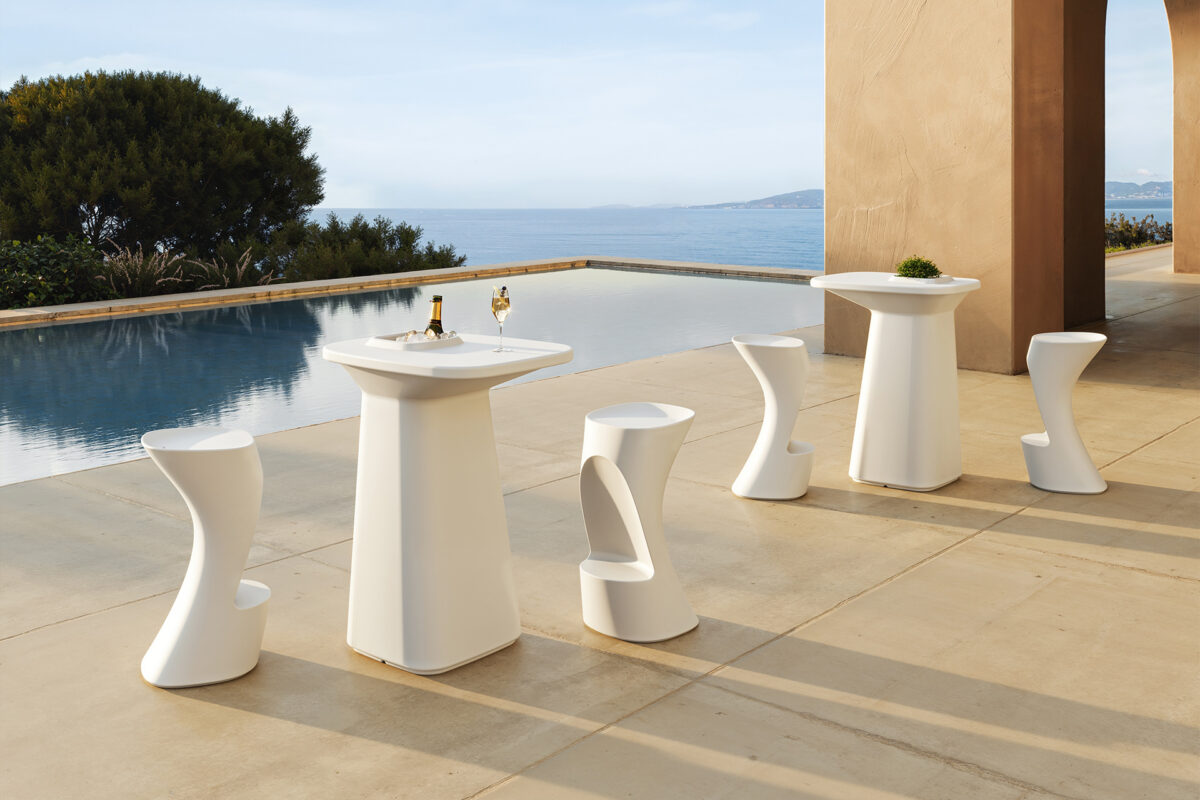 "Elegant NOMA table by Vondom designed for indoor and outdoor modern spaces."