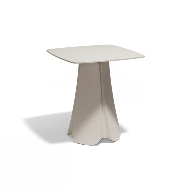 "Contemporary PEZZETTINA dining table designed by Vondom with nature-inspired aesthetics."