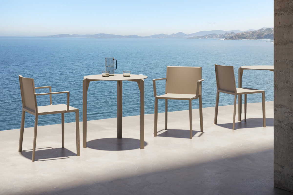 "Angular and sleek QUARTZ table by Vondom with weather-resistant materials and bold lines."