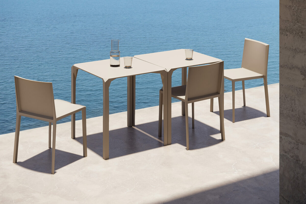 "Faceted Vondom QUARTZ dining table with strong architectural styling and outdoor-ready build."