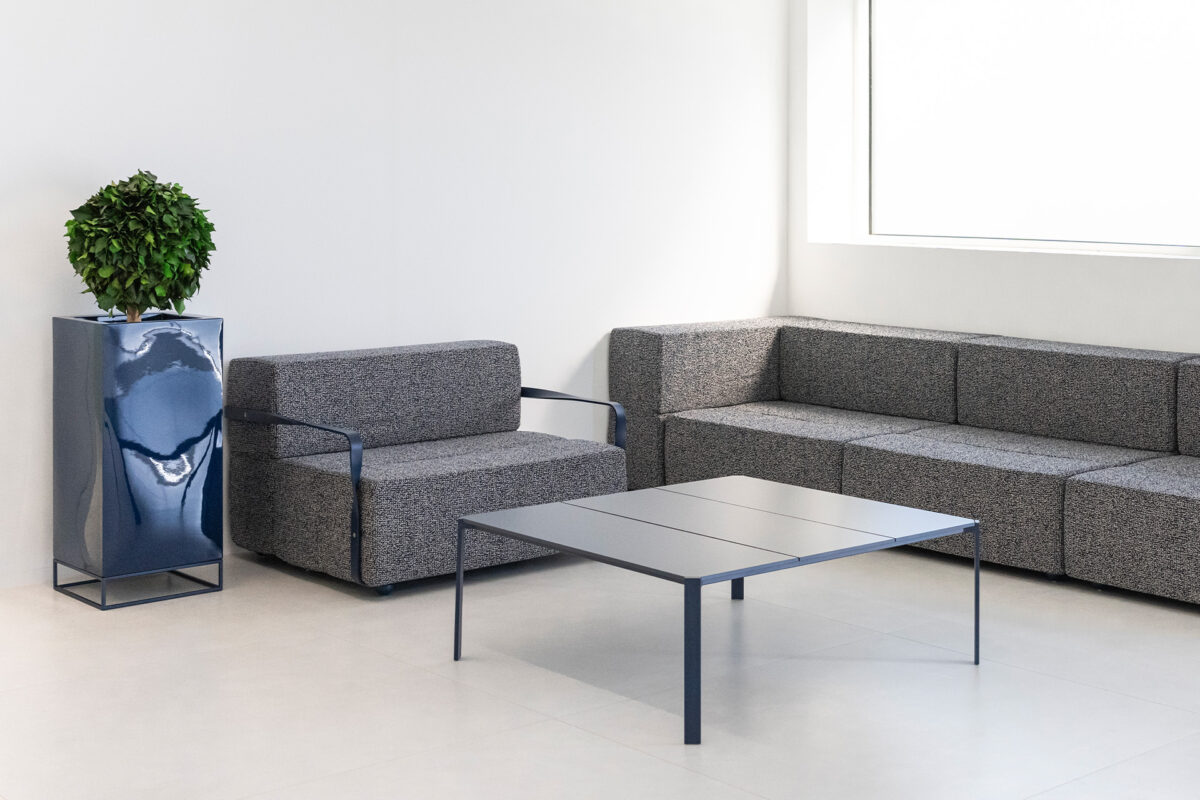 "Designer TABLET lounge chair by Vondom with weather-resistant upholstery and low-profile base."
