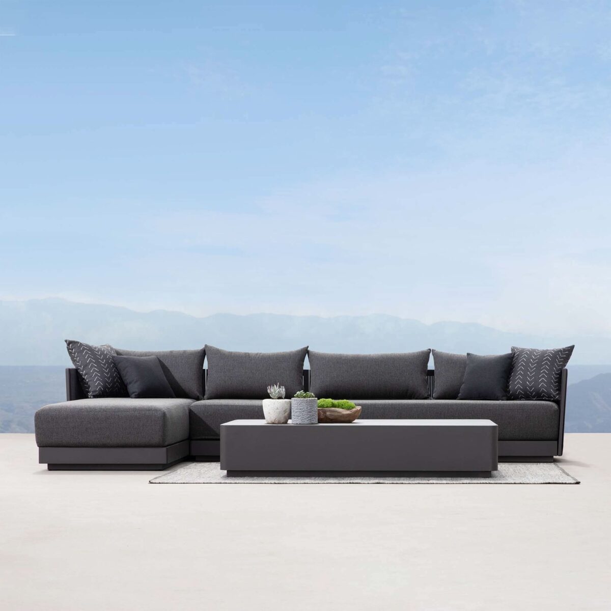 “Back view of Antigua 2 Seat with right arm – durable outdoor seating piece with refined design”